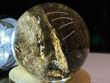 Load image into Gallery viewer, 2.3" Tricolor Rutile Smokey Quartz Sphere 312 grams