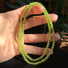 Load image into Gallery viewer, AA Peridot 5mm Bead Necklace 10.25"