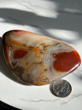 Load image into Gallery viewer, 4.5” x 2.7” Sardonyx Larger Palm Stone 230 grams
