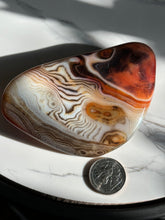 Load image into Gallery viewer, 4.5” x 2.7” Sardonyx Larger Palm Stone 230 grams
