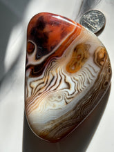 Load image into Gallery viewer, 4.5” x 2.7” Sardonyx Larger Palm Stone 230 grams
